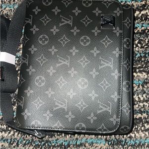 Louis Vuitton Messenger District
Monogram Eclipse PM Noir Black